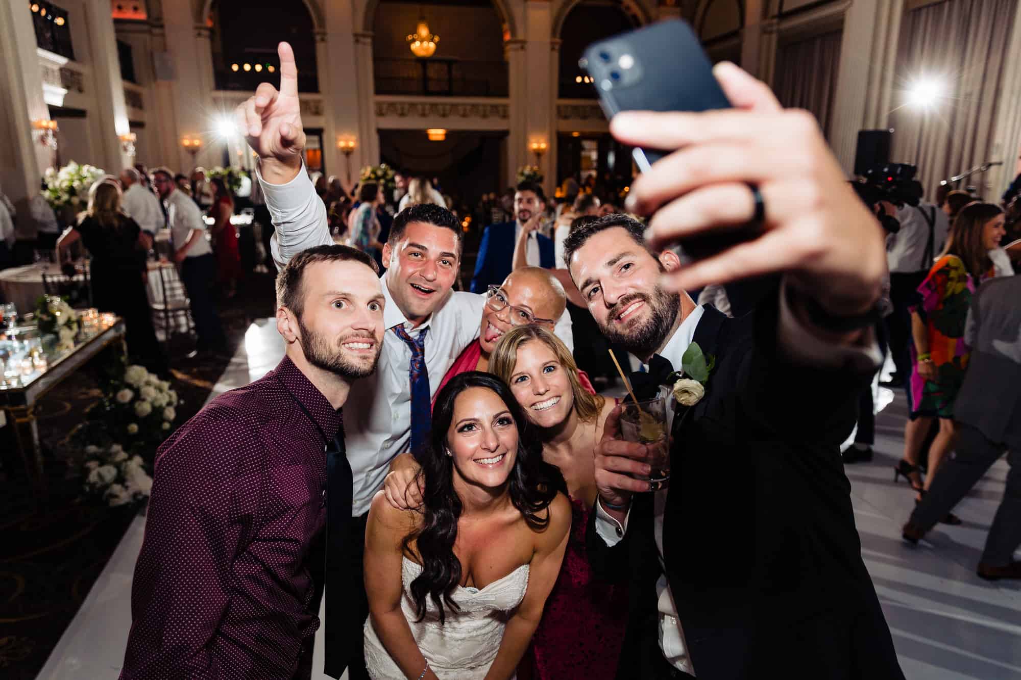 guests enjoying the party at the Ballroom of the Ben