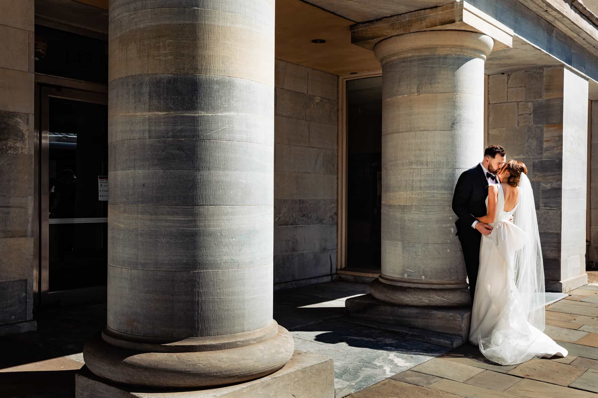 intimate moment between the bride and groom outside the church