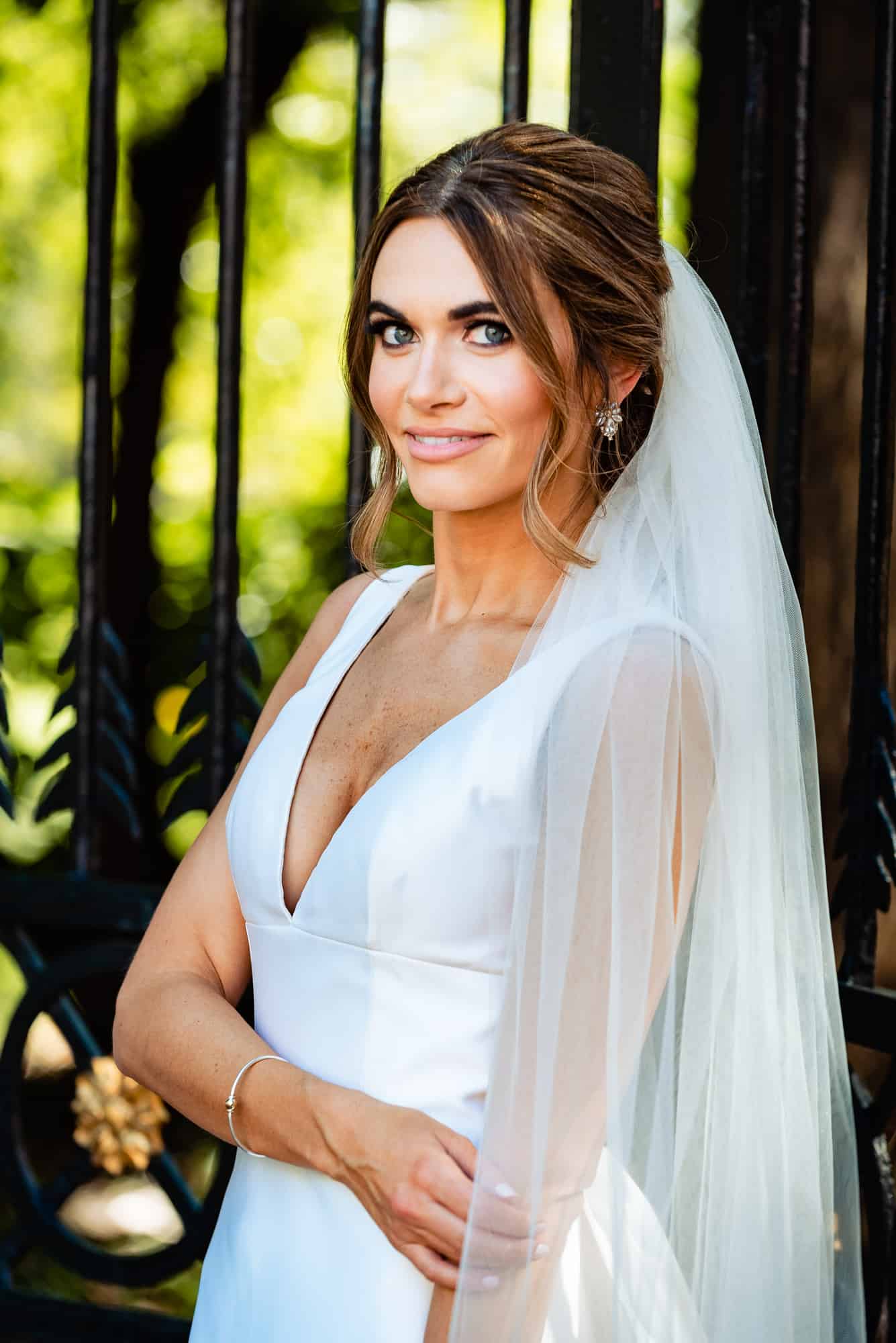 smiling bride posing for the camera