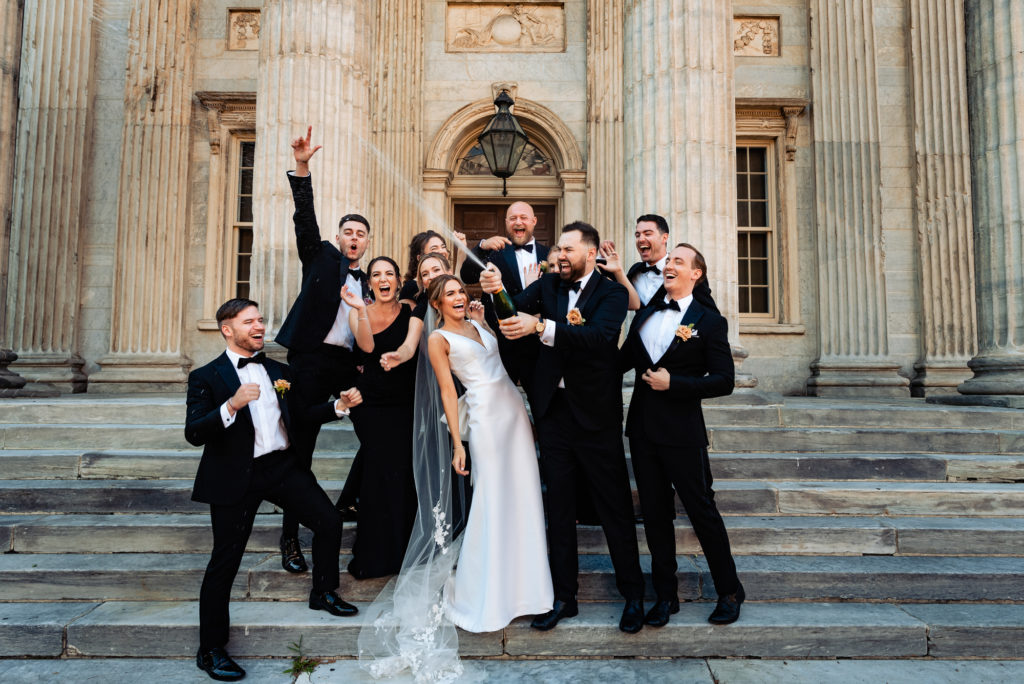 couple with the whole wedding entourage