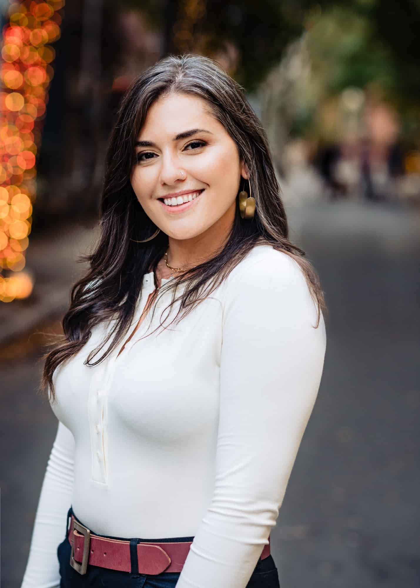 bride-to-be smiling for her e-session in center city philly