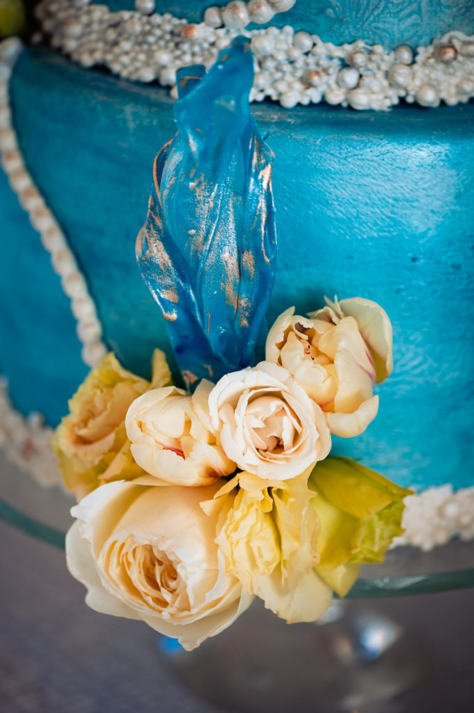 close up shot of a wedding cake at the Ritz-Carlton Half Moon Bay