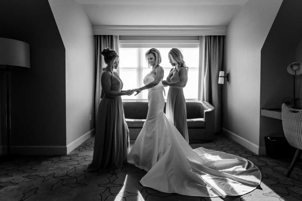 bride getting ready in her suite at Ritz-Carlton Half Moon Bay