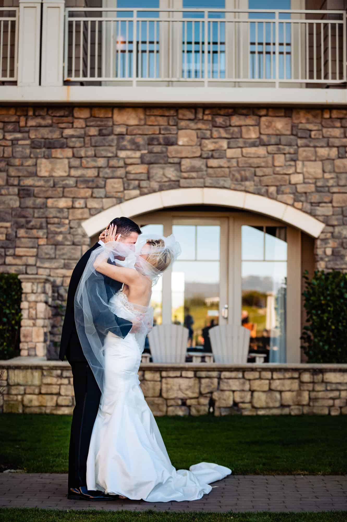 intimate shot of a couple before the wedding outside the Ritz-Carlton Half Moon Bay