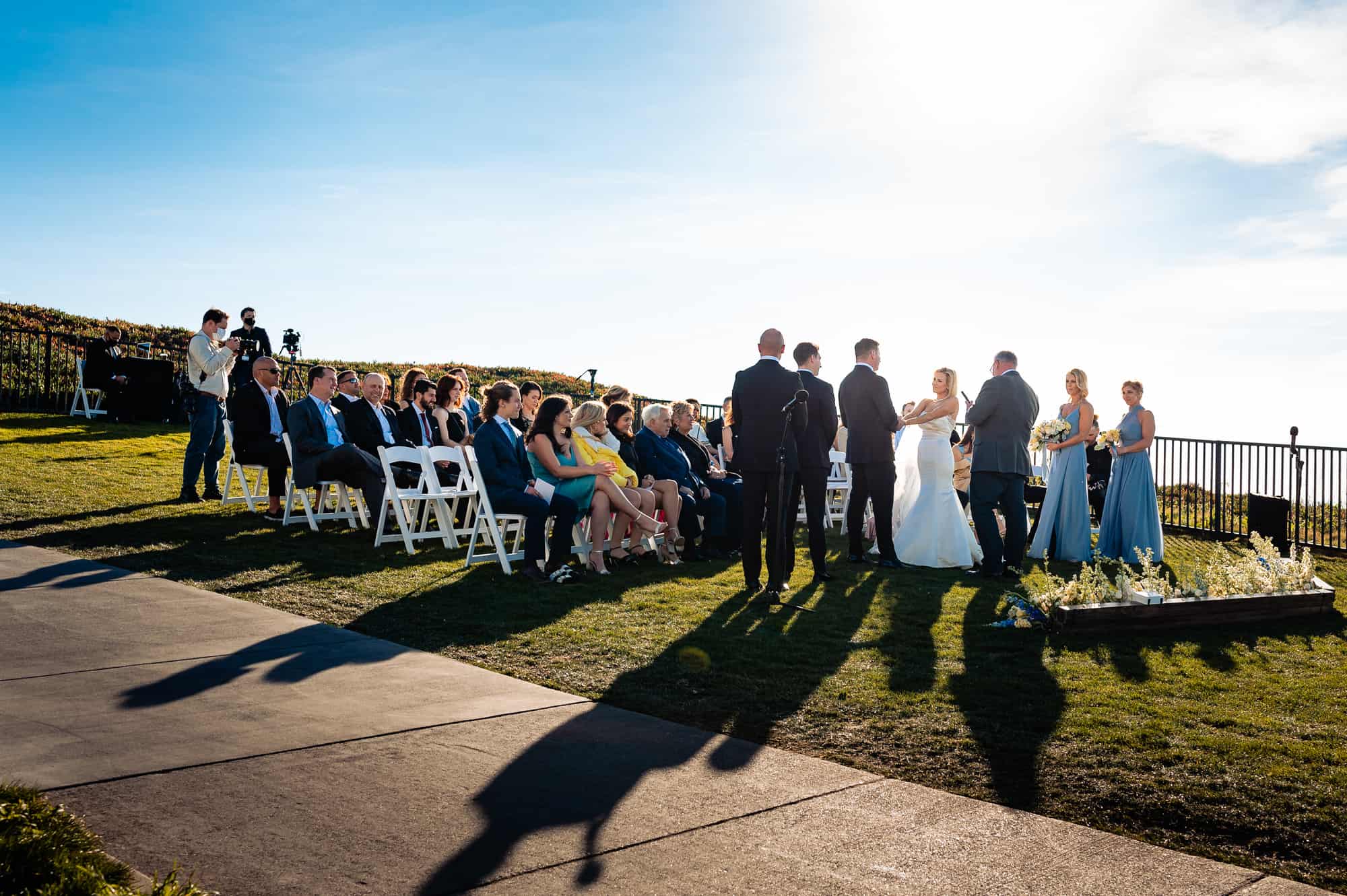 beach wedding ceremony held outside the Ritz-Carlton Half Moon Bay