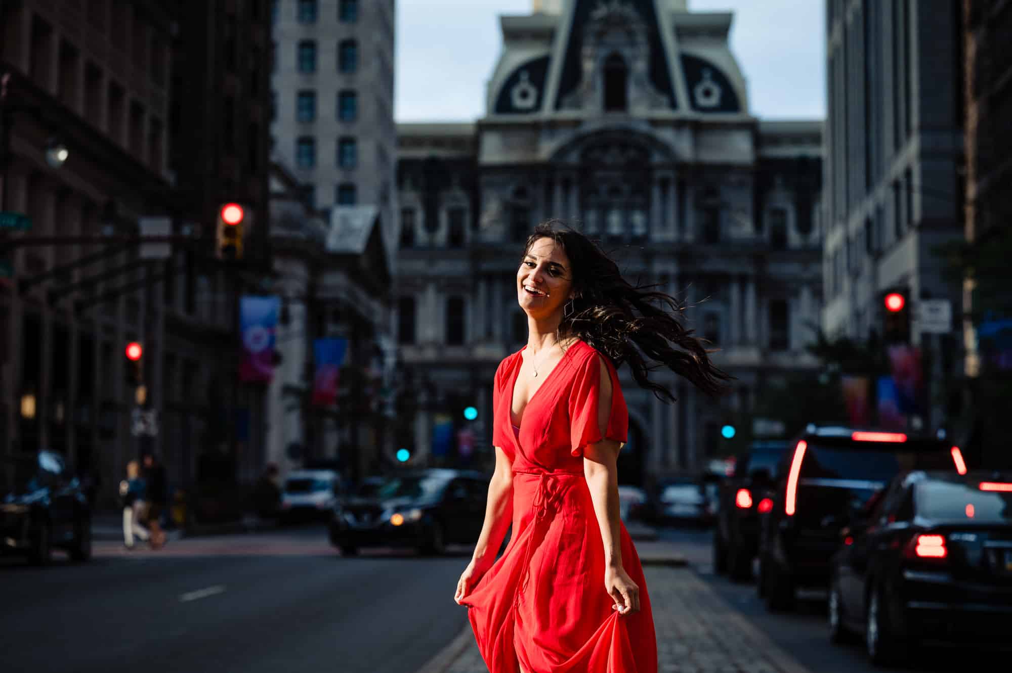 candid shot of the bride-to-be during her philly art museum e-shoot