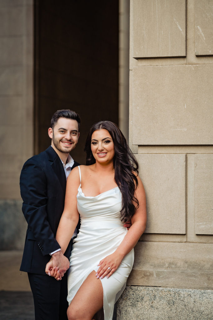 couple poses during their center city e-shoot