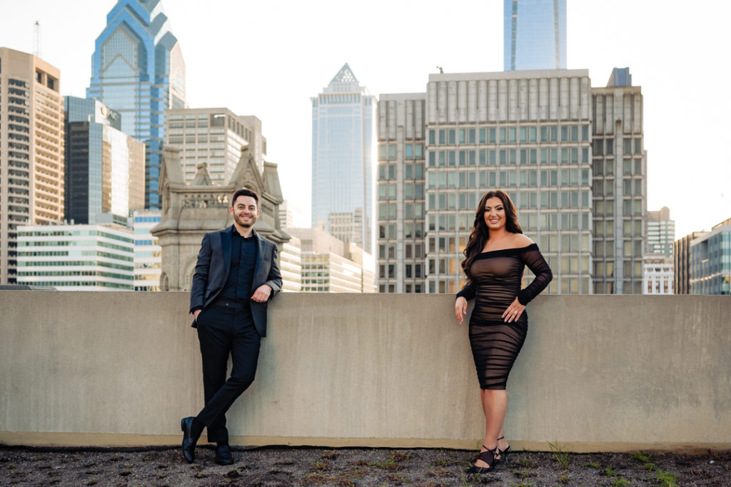 couple poses for their center city e-shoot