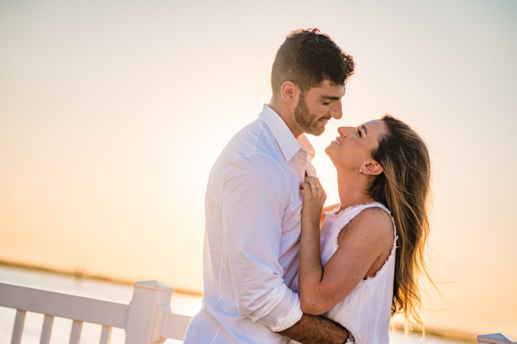 intimate moment between the couple at sunset