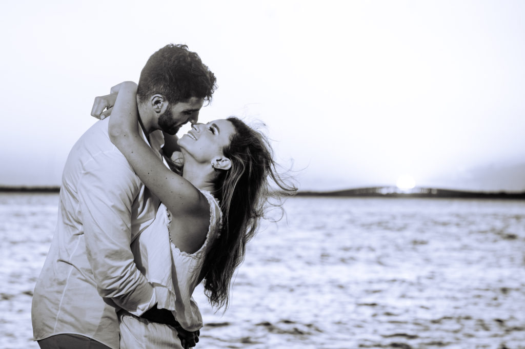 black and white shot of a couple's intimate moment during their margate new jersey e-session