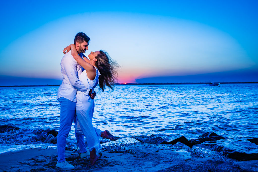 sunset shot of couple at the beach