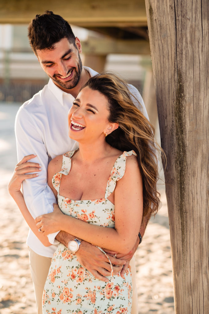 couple taking a pose during their margate new jersey e-session