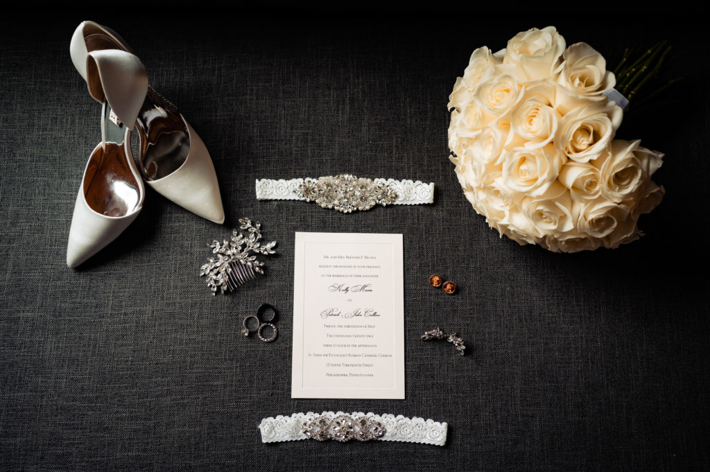 the bridal accessories and wedding invitation