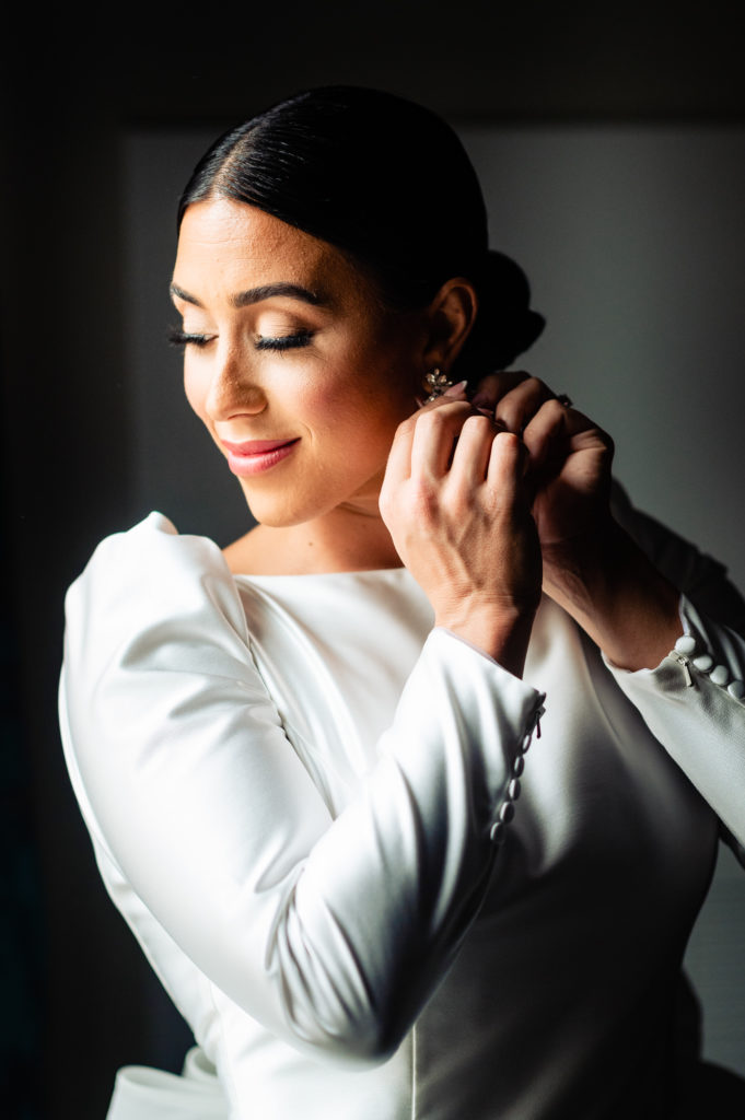 bride wearing her earring