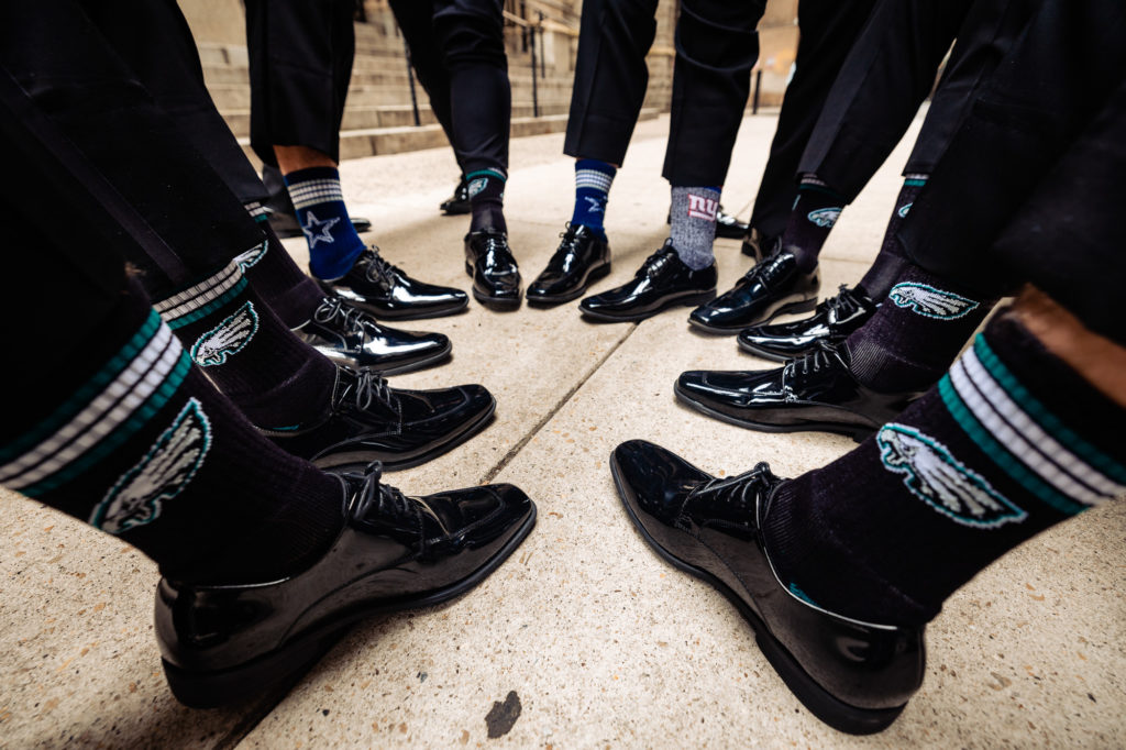 GROOM AND GROOMSMEN HAVING MATCHING SOCKS