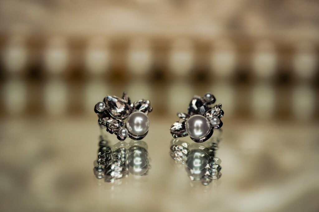 a pair of pearl earrings