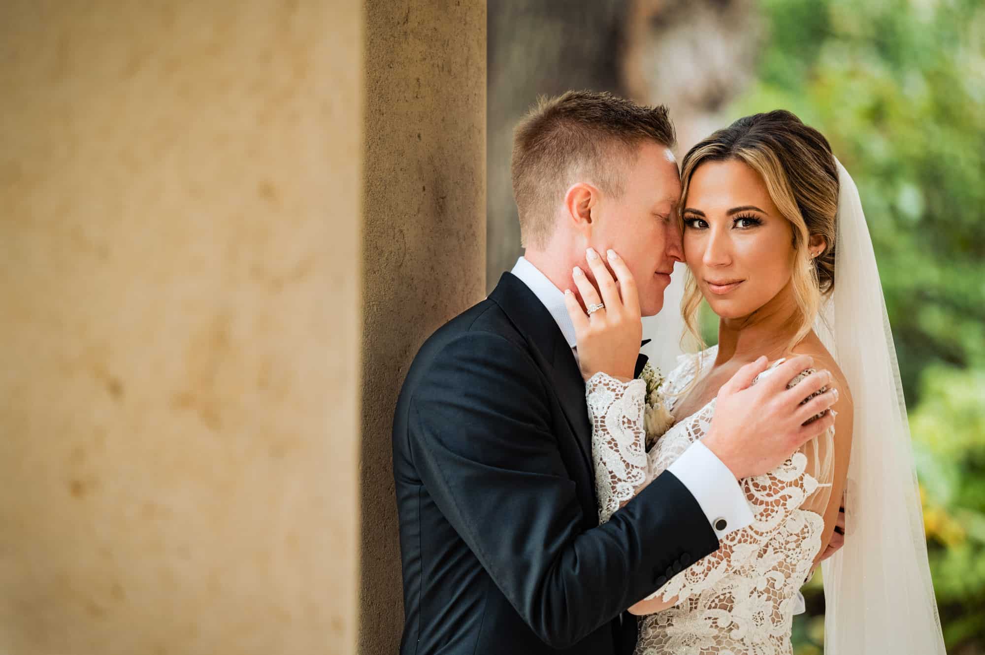 bride and groom posing for the camera