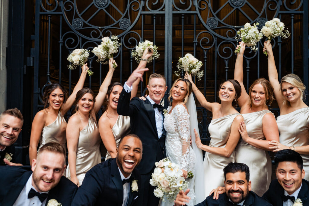 couple with the bridesmaids and groomsmen