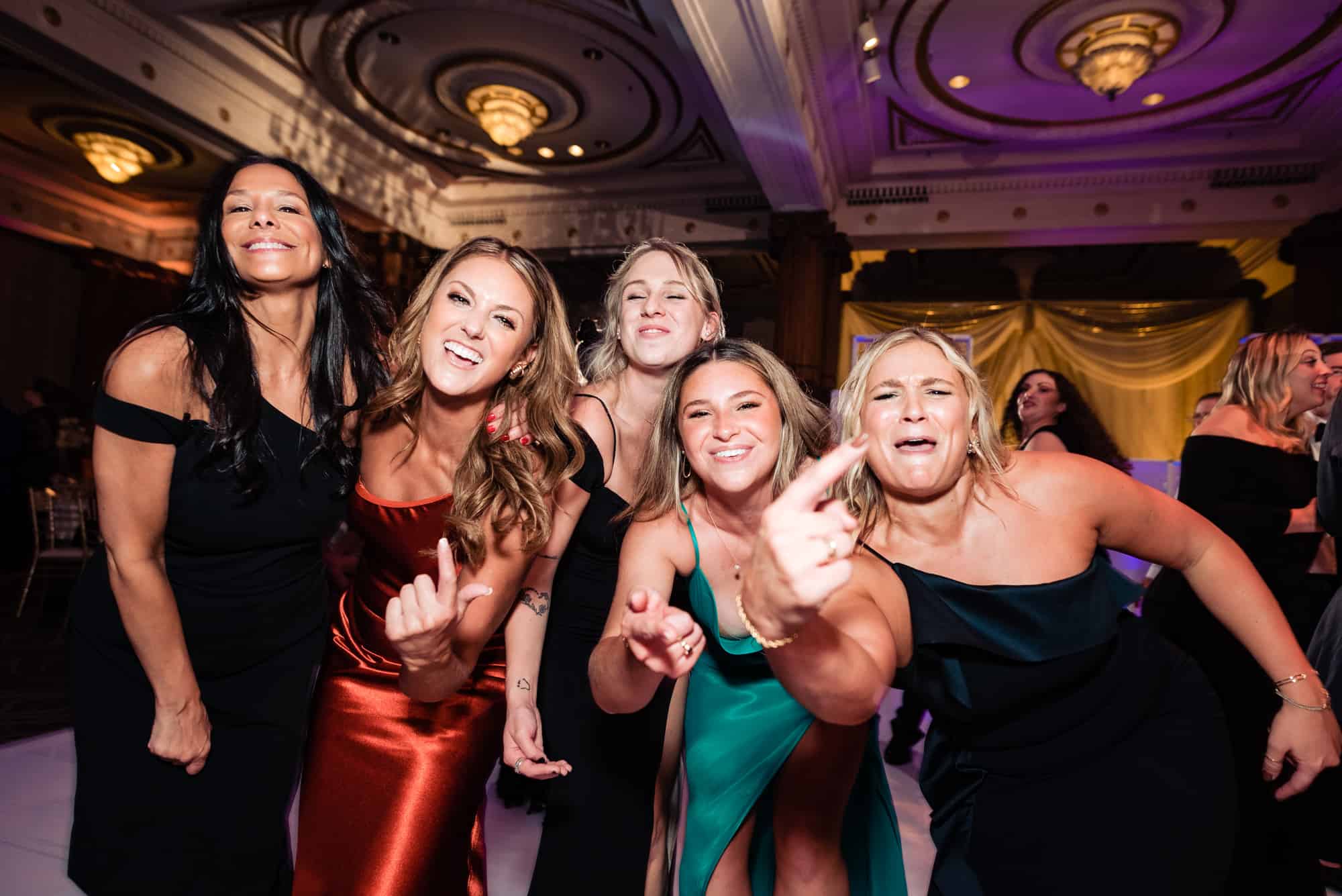 shot of the bridesmaids posing at the camera