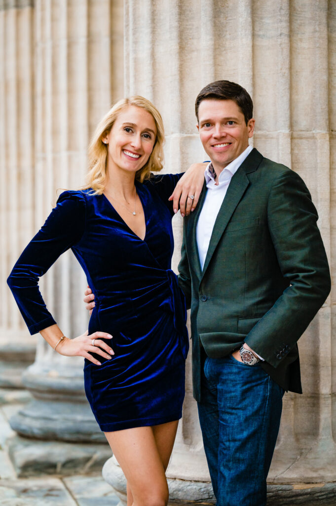 modern couple posing confidently the 1st Bank of the United States during their old city engagement session