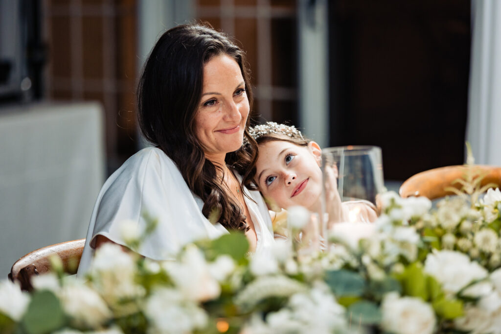 tender moment between the bride and her daughter