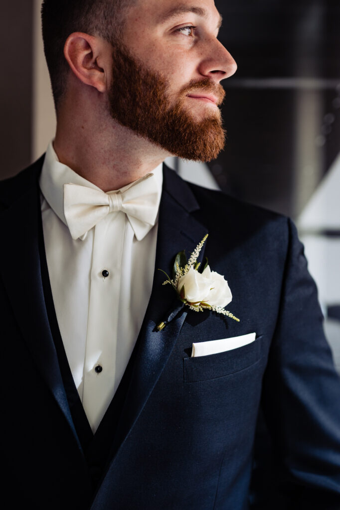 side view shoot while groom is smilling