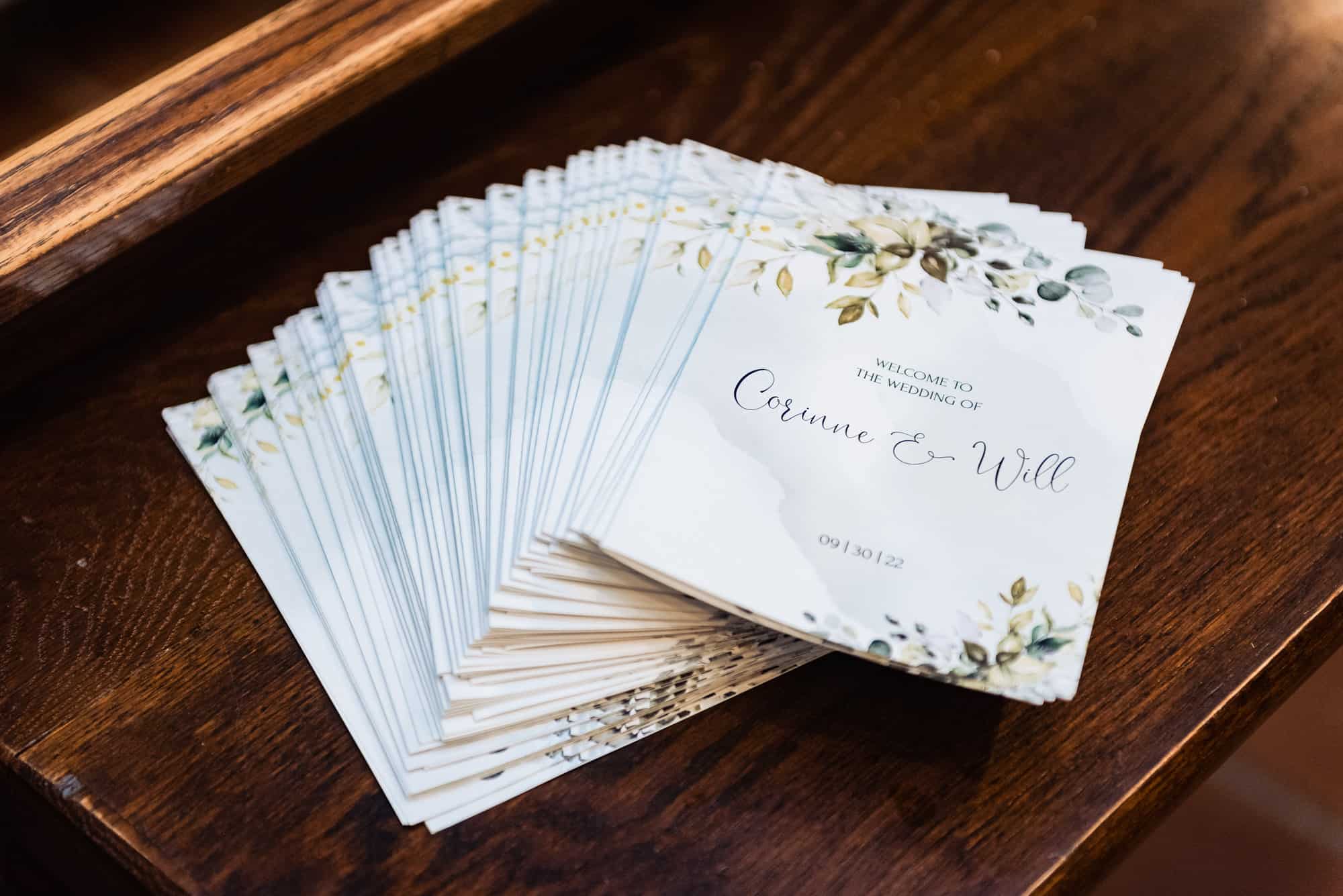 a stack of wedding invitations