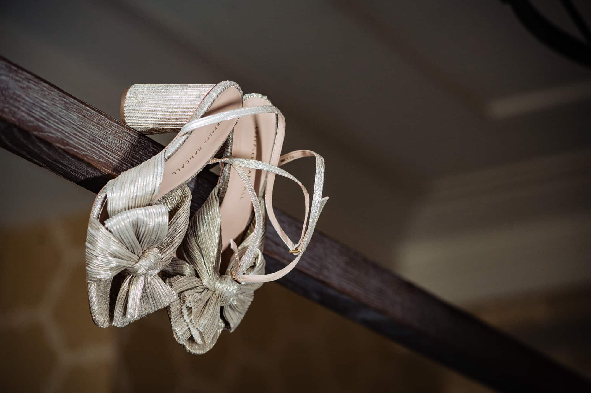 the silver colored bridal shoes