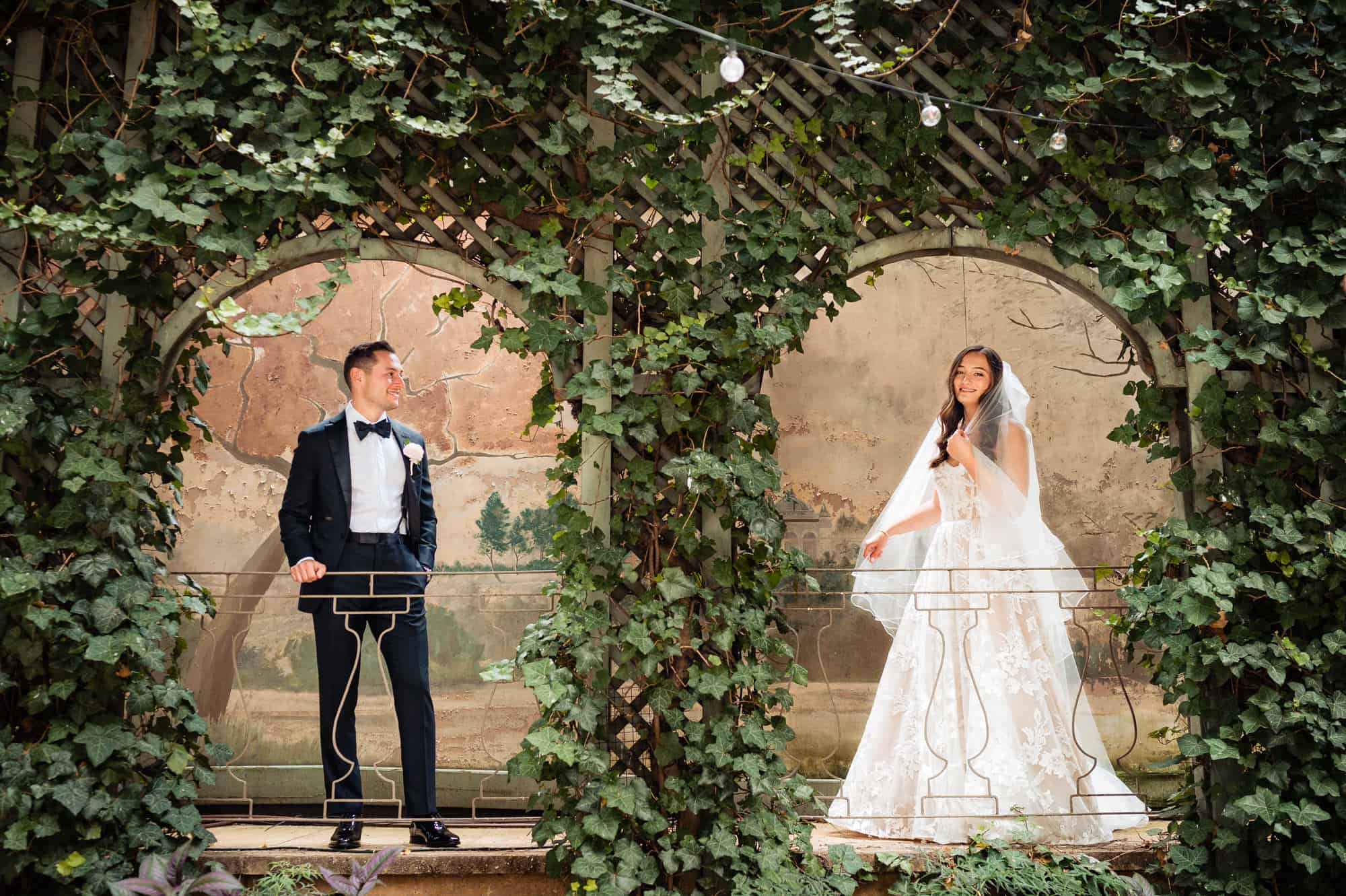 couple take a pose at the rittenhouse hotel's garden