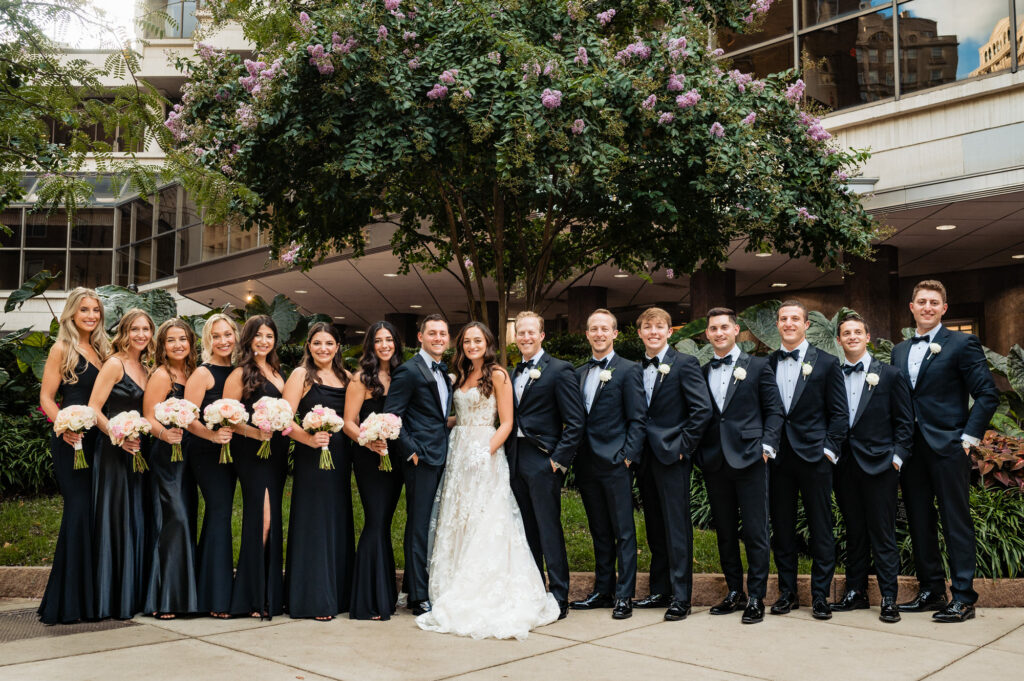 the bridal party including the newlyweds at their rittenhouse hotel wedding