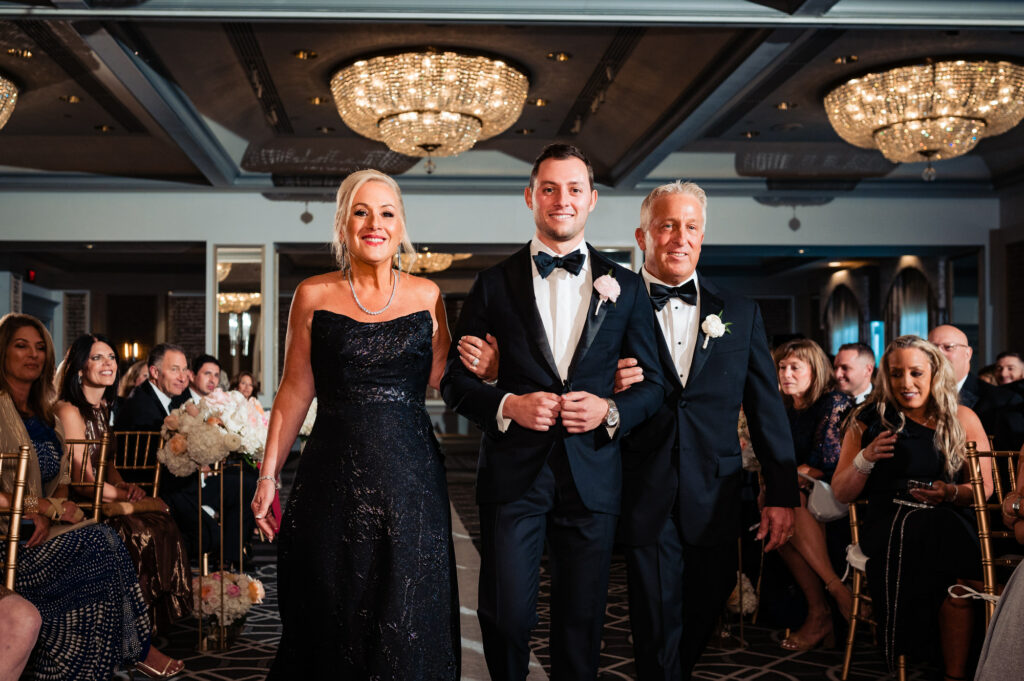 the groom's processional march with his parents