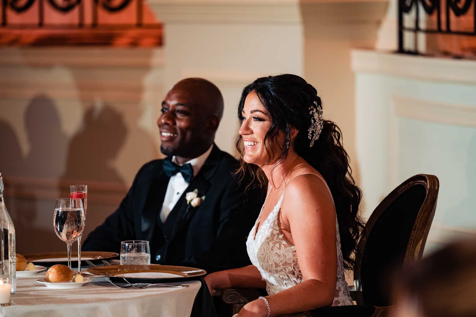 newlyweds are all smiles in their presidential table