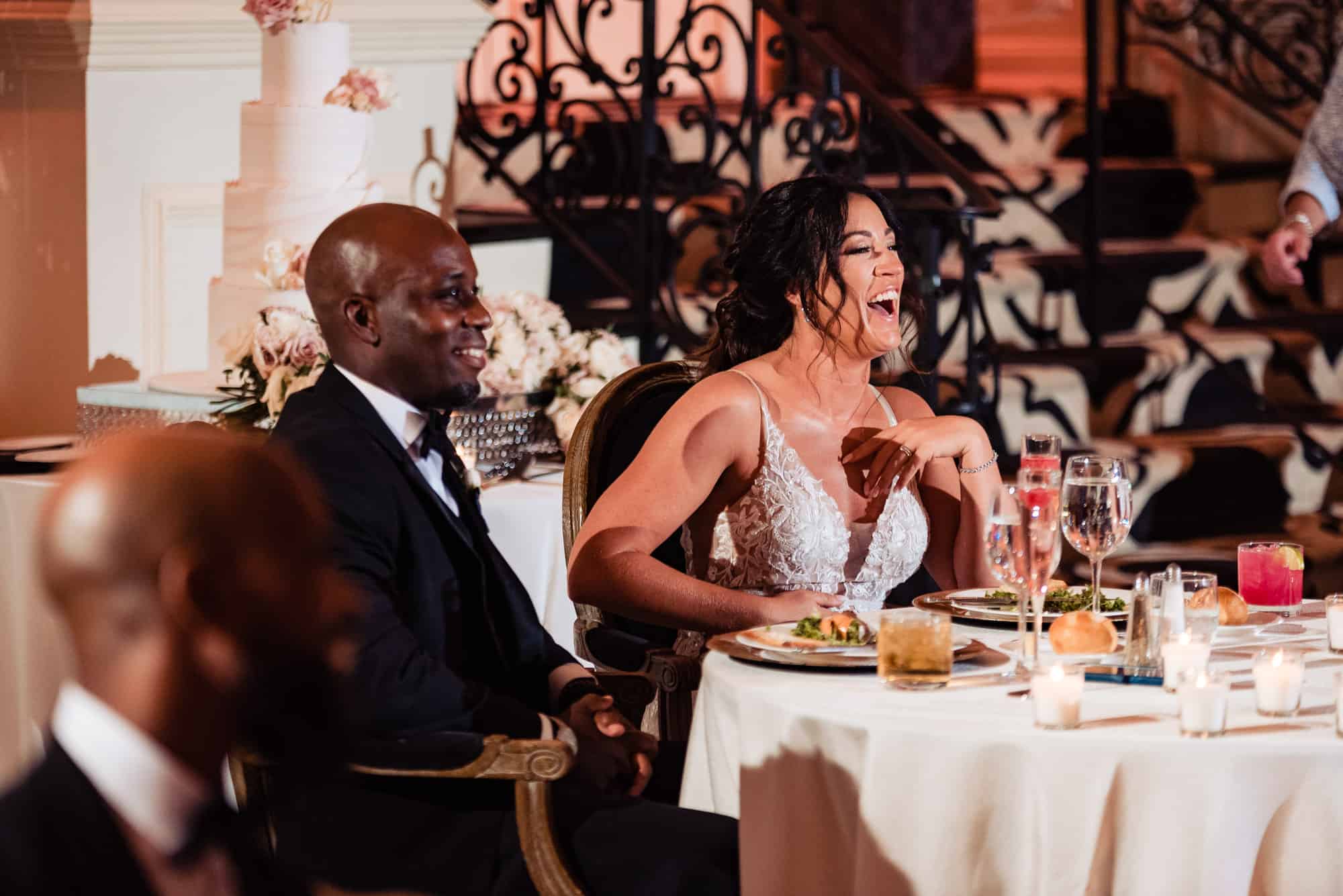 newlyweds are all smiles in their presidential table