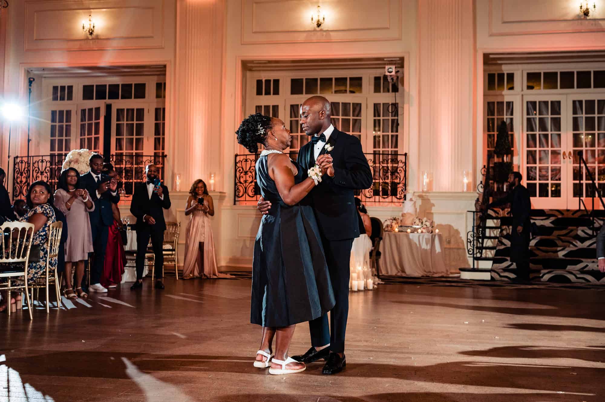 groom dancing with his mother