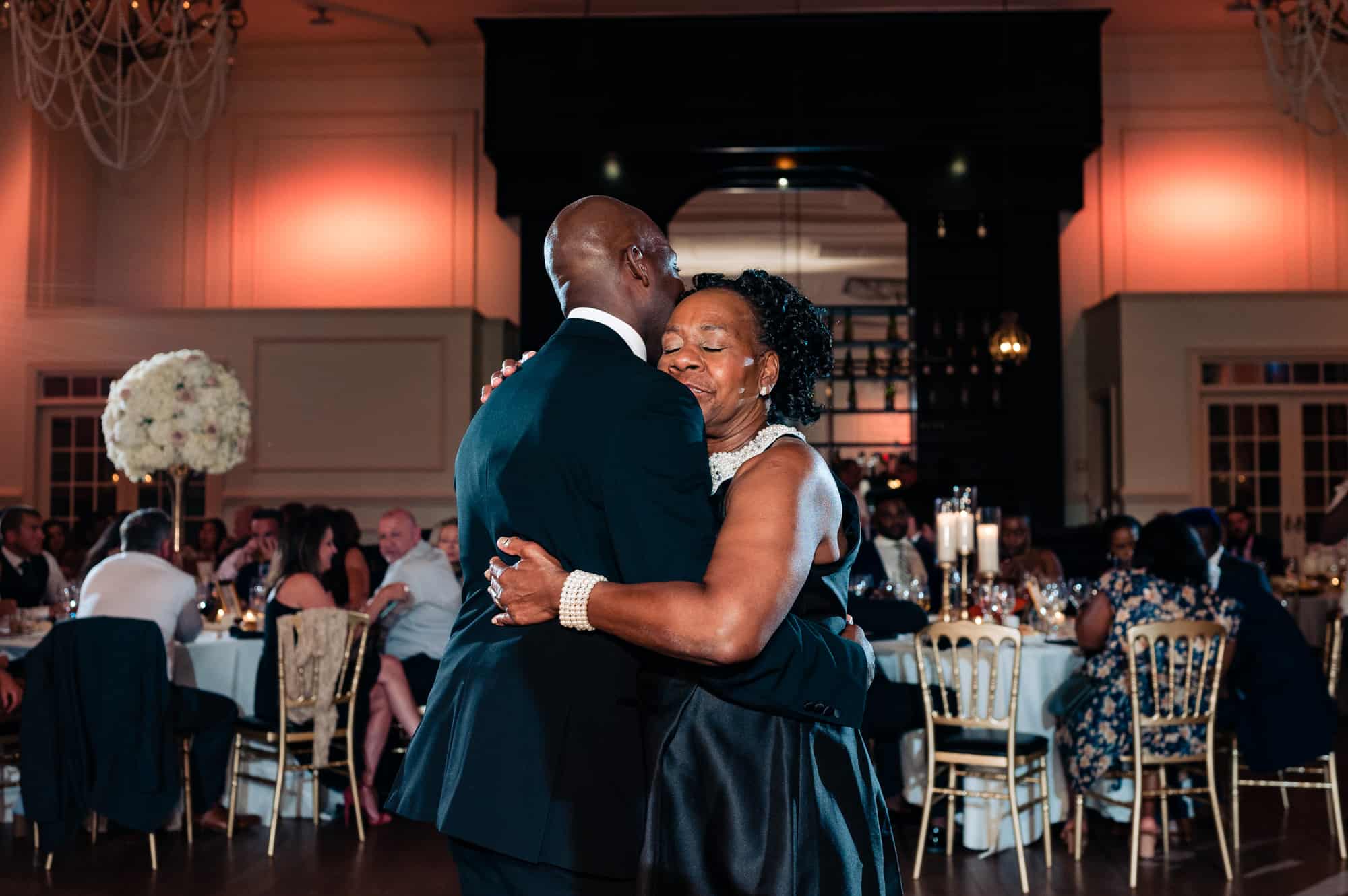 groom dancing with his mother