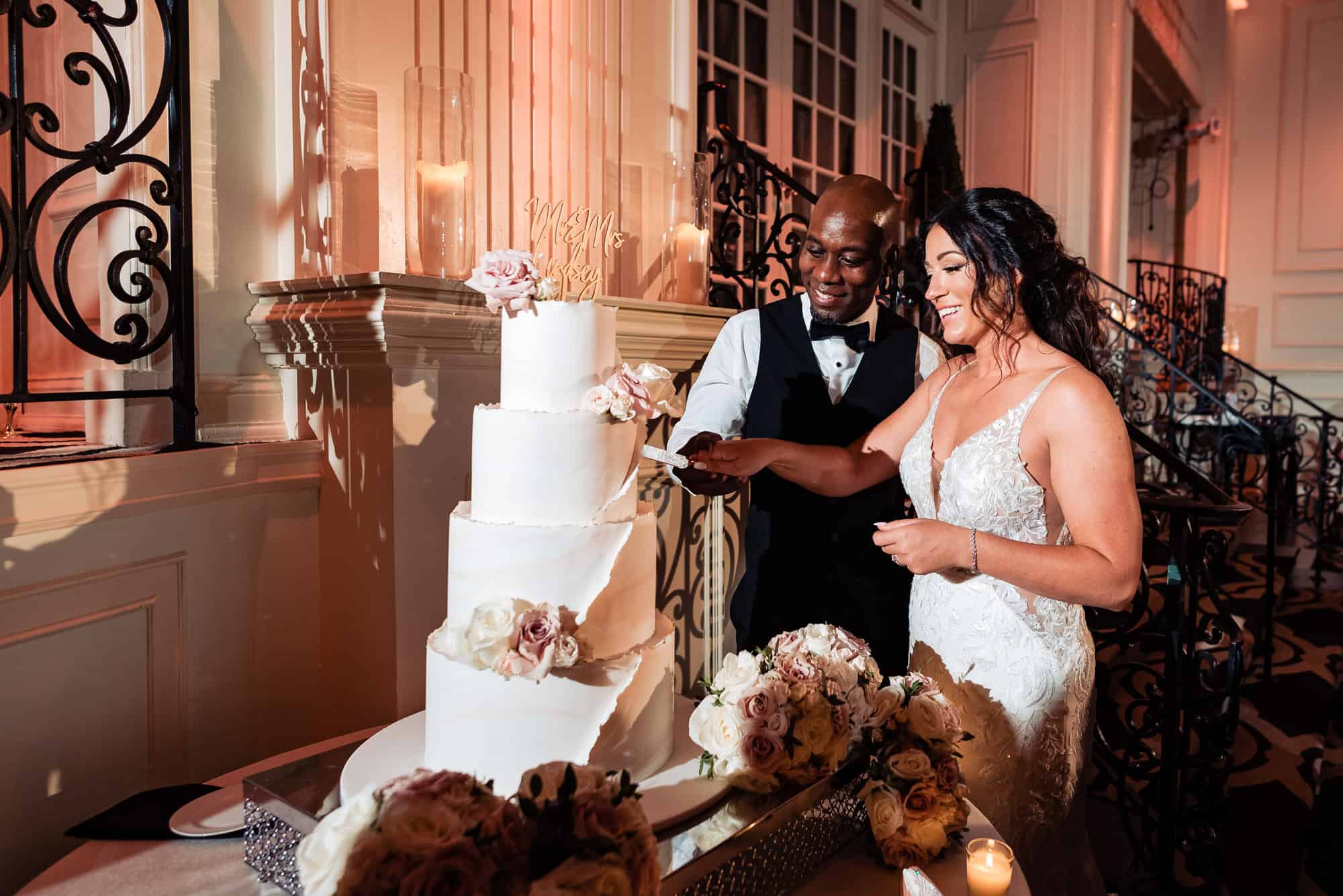 newlyweds cutting their cake