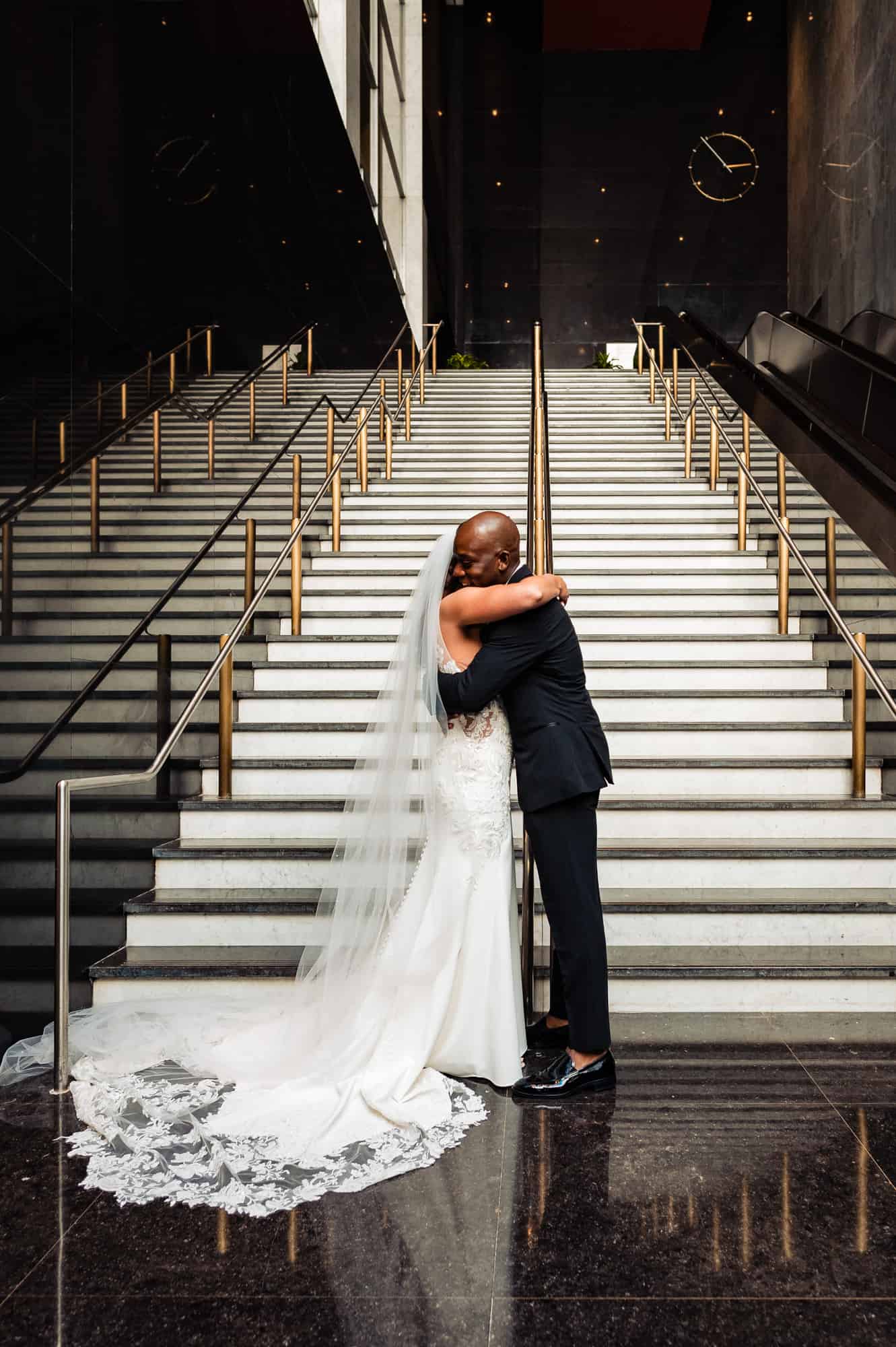 groom and bride hugs after their first look