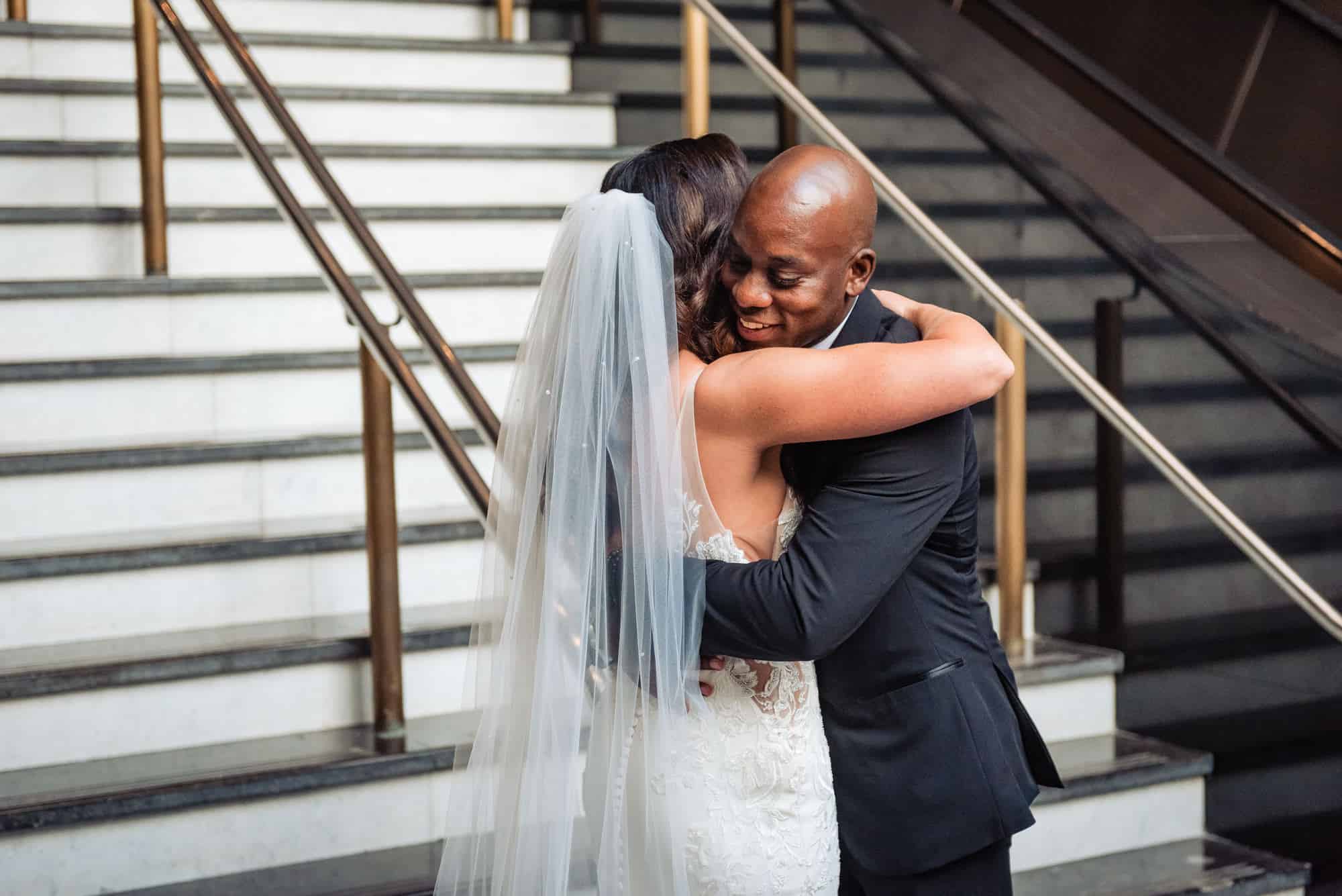 couple hugs after their first look