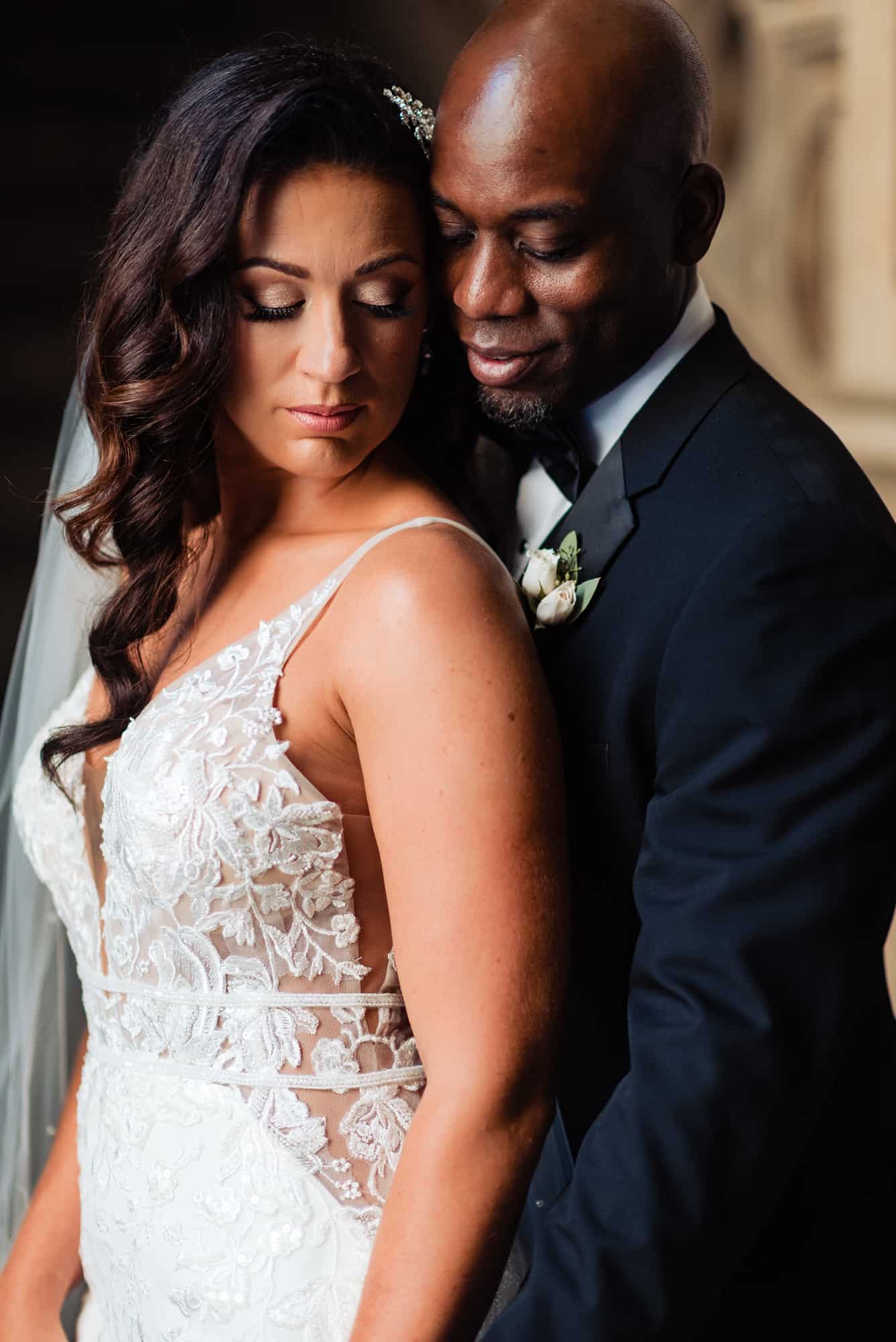 close up shot of the couple taking a candid pose before their center city wedding at cescaphe ballroom