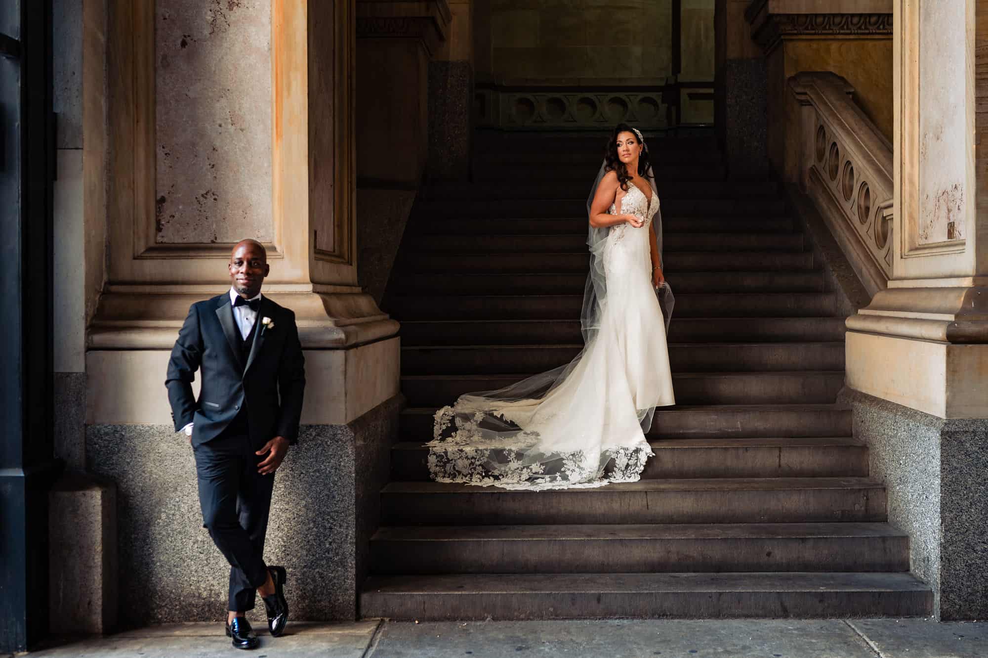 couple takes a pose before the wedding ceremony