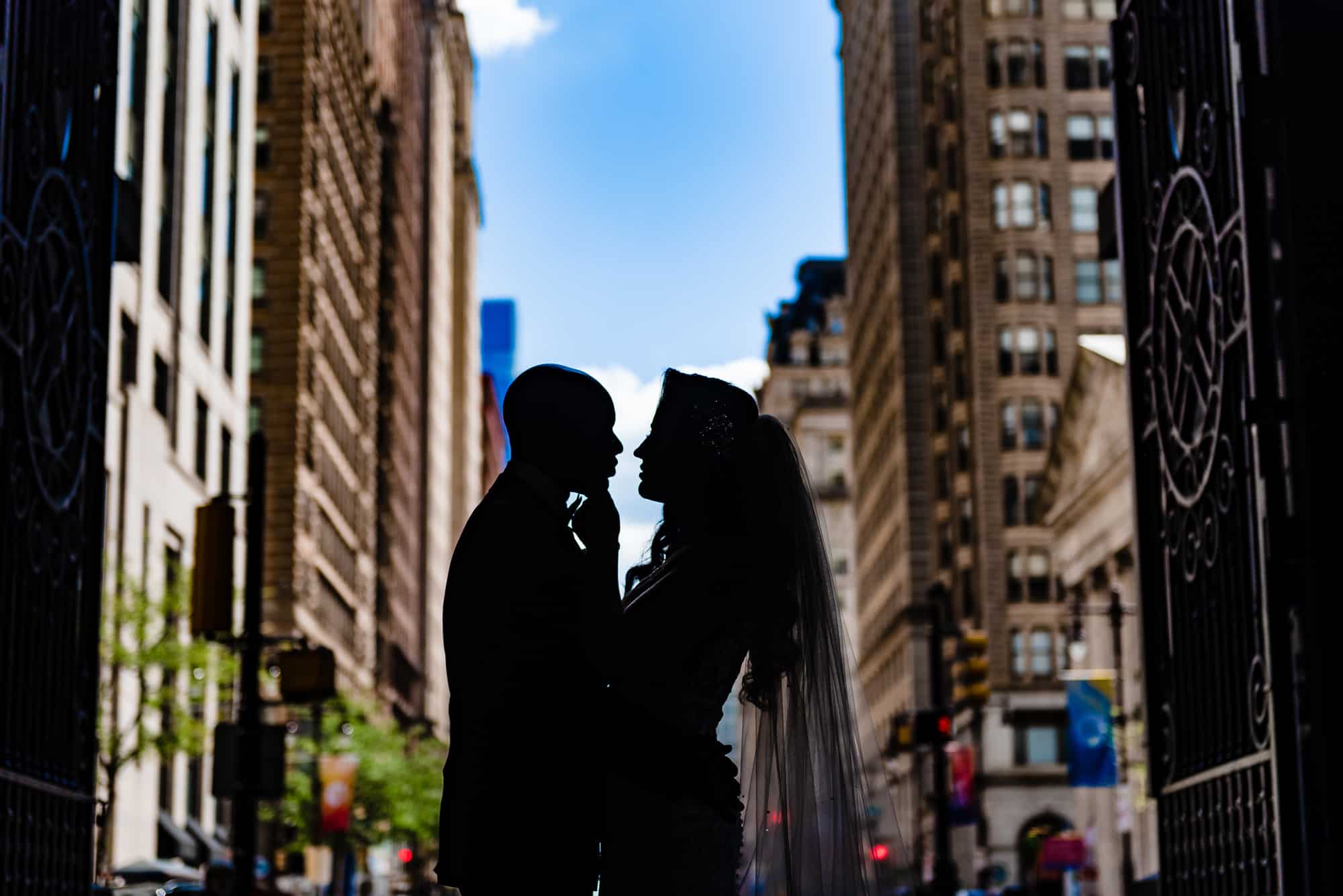 silhouette shot of the couple across the street