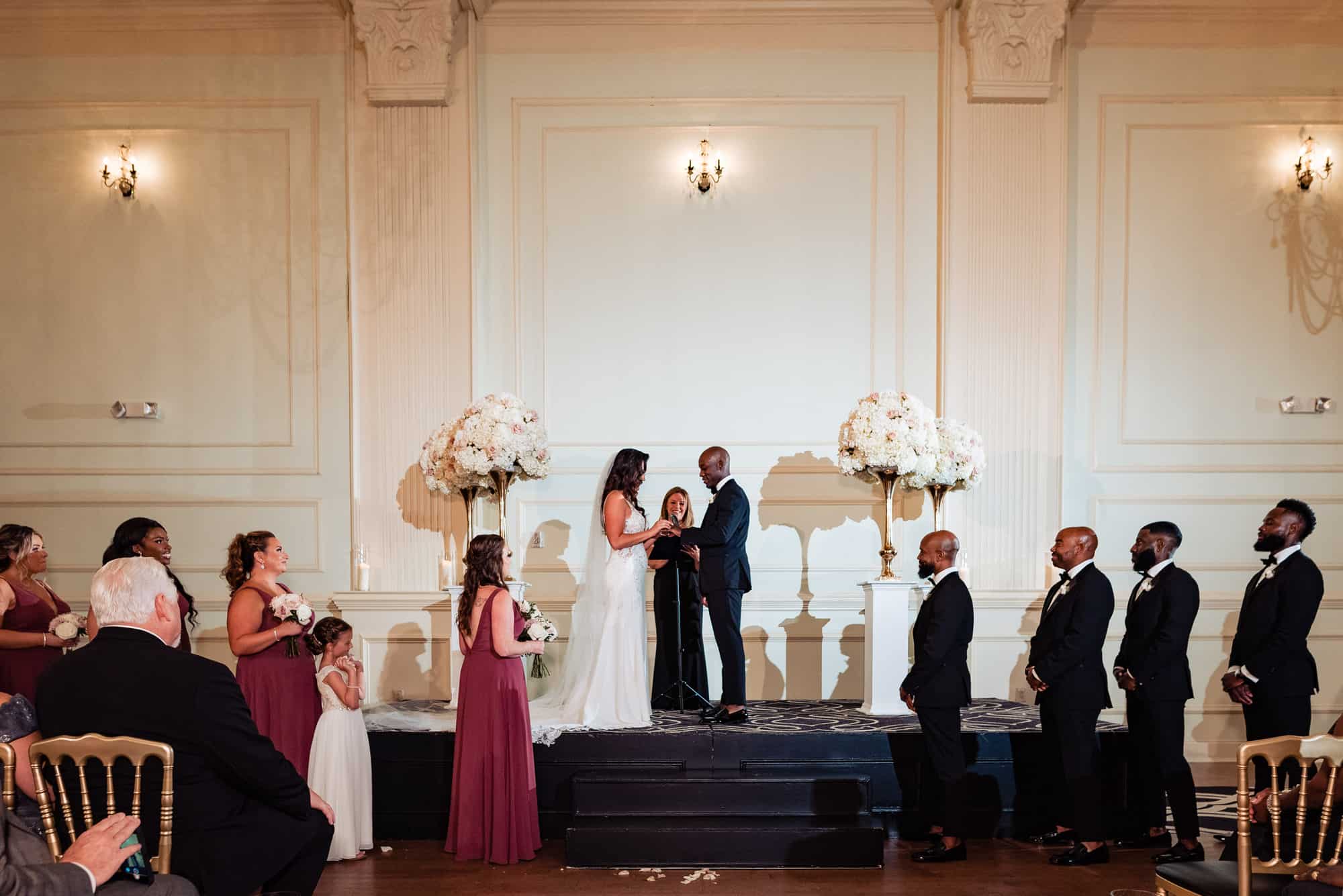 bride and groom reciting their vows during their wedding ceremony at center city