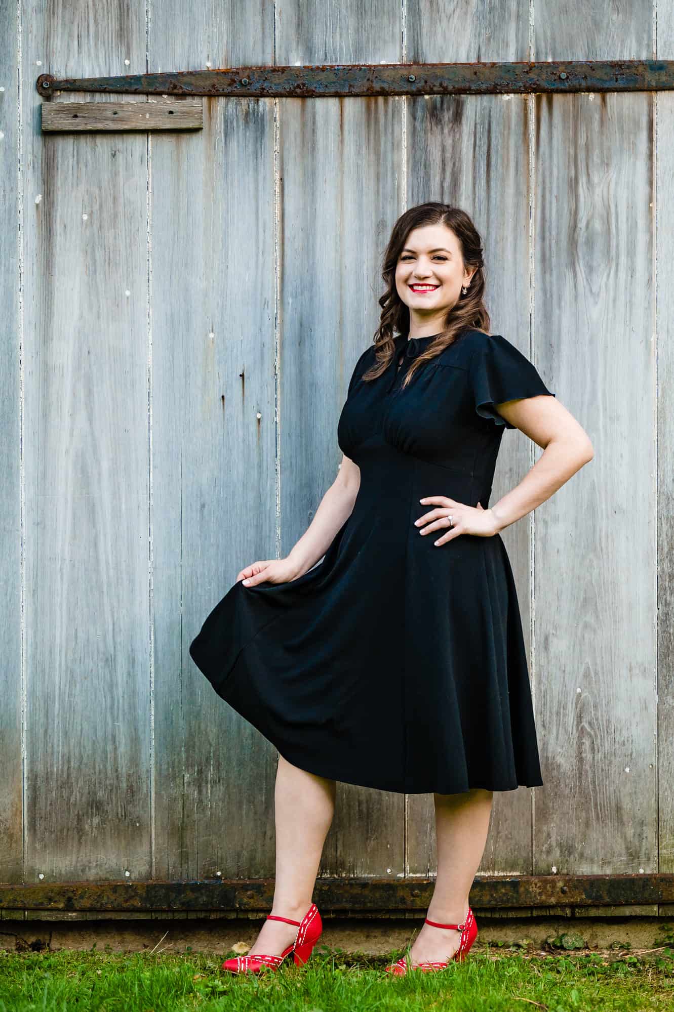 solo shot of the bride-to-be in a black dress captured by ralph deal photography