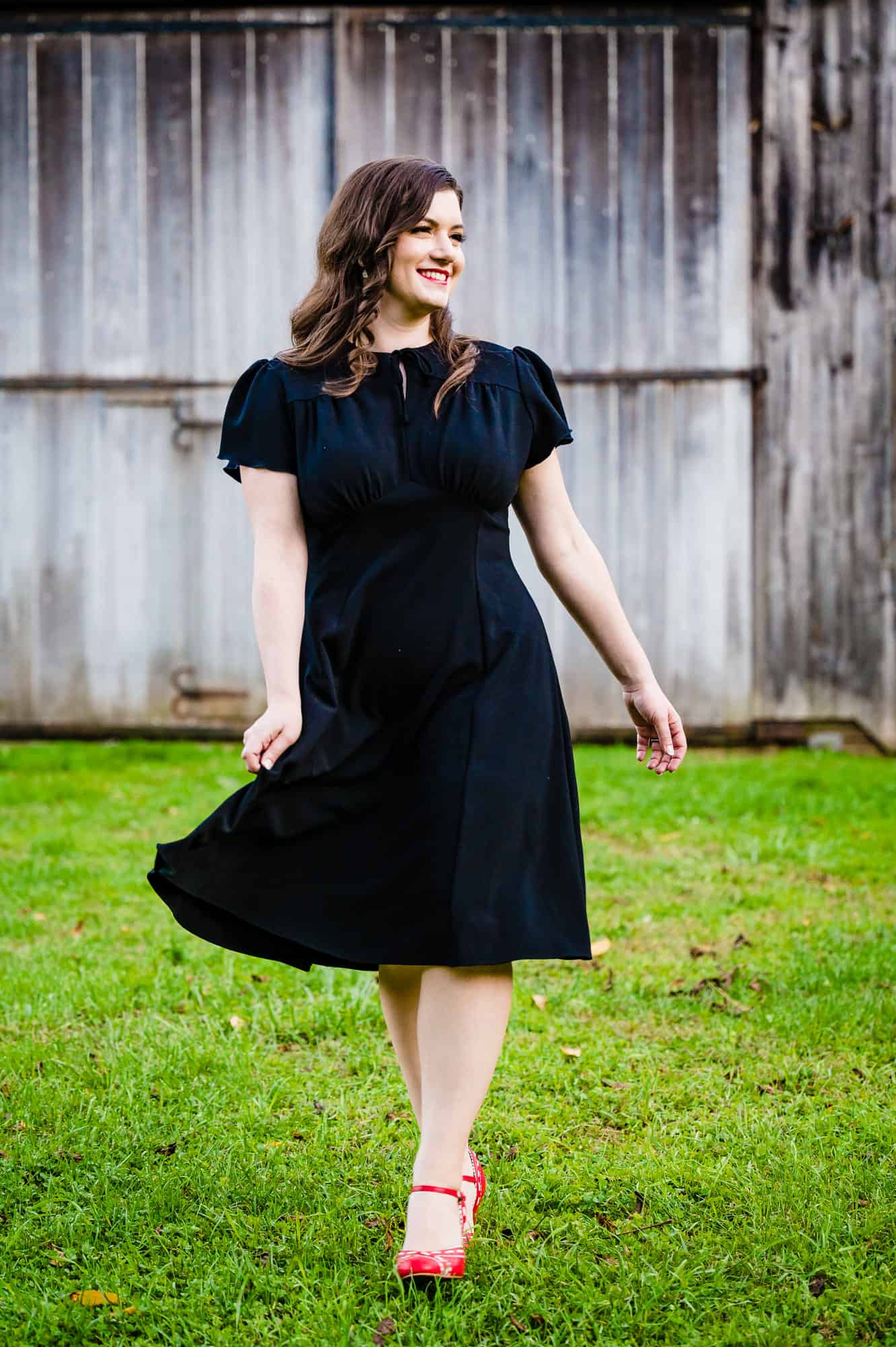 solo shot of the bride-to-be in a black dress