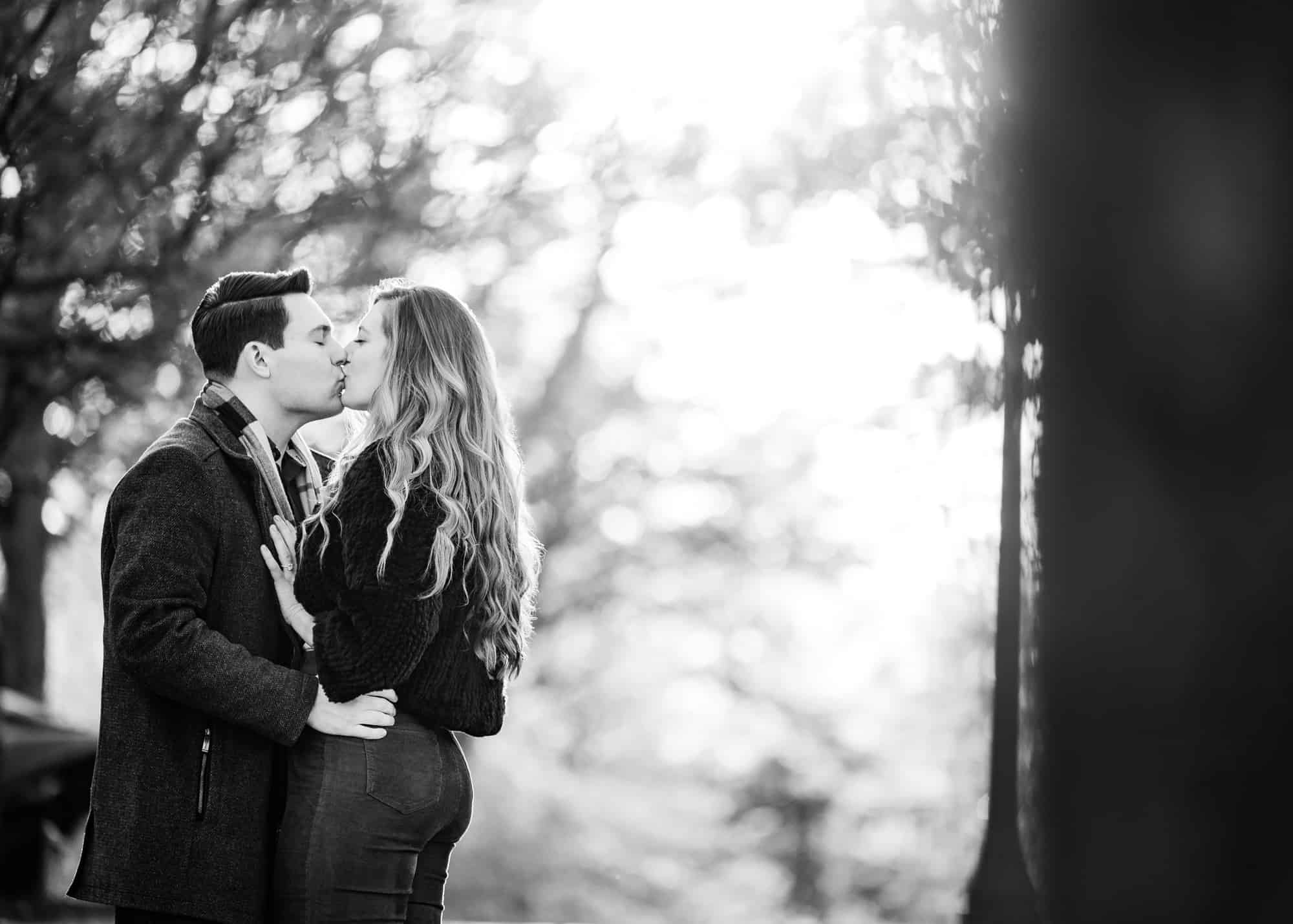 couple shares a kiss during their e-shoot