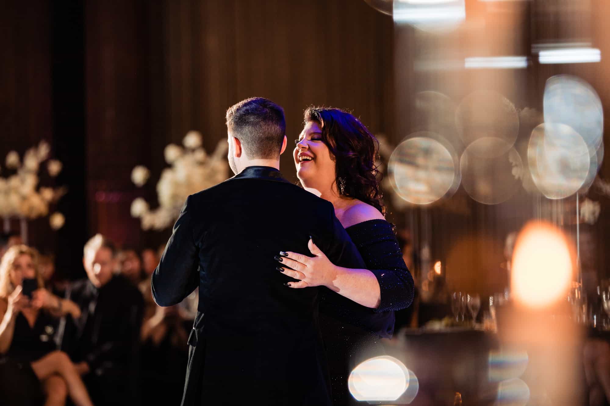 groom dancing with his mother