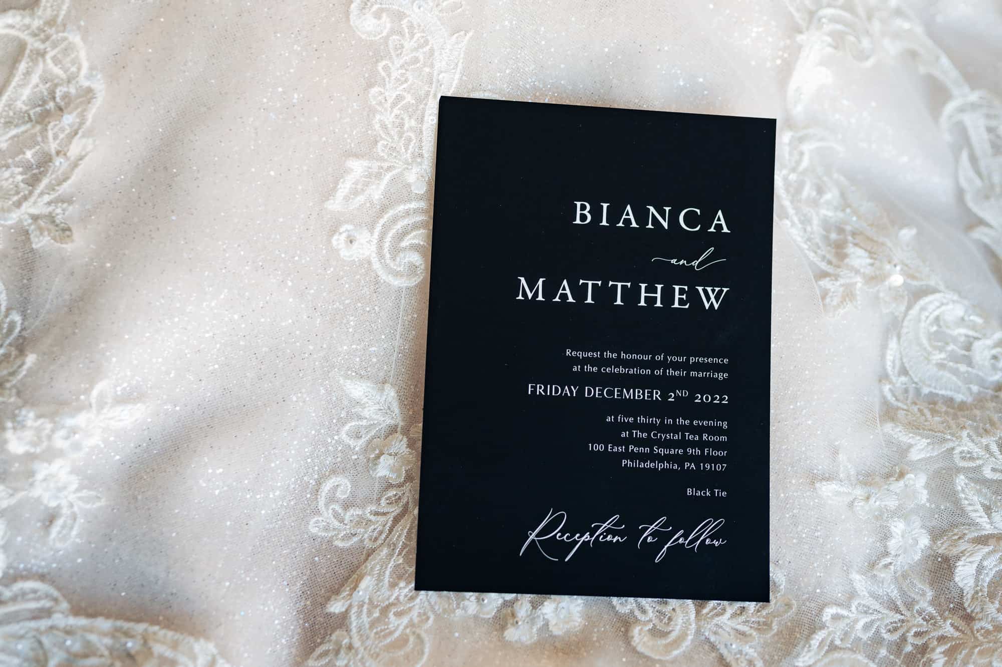 black wedding invitation for a wedding at the crystal tea room