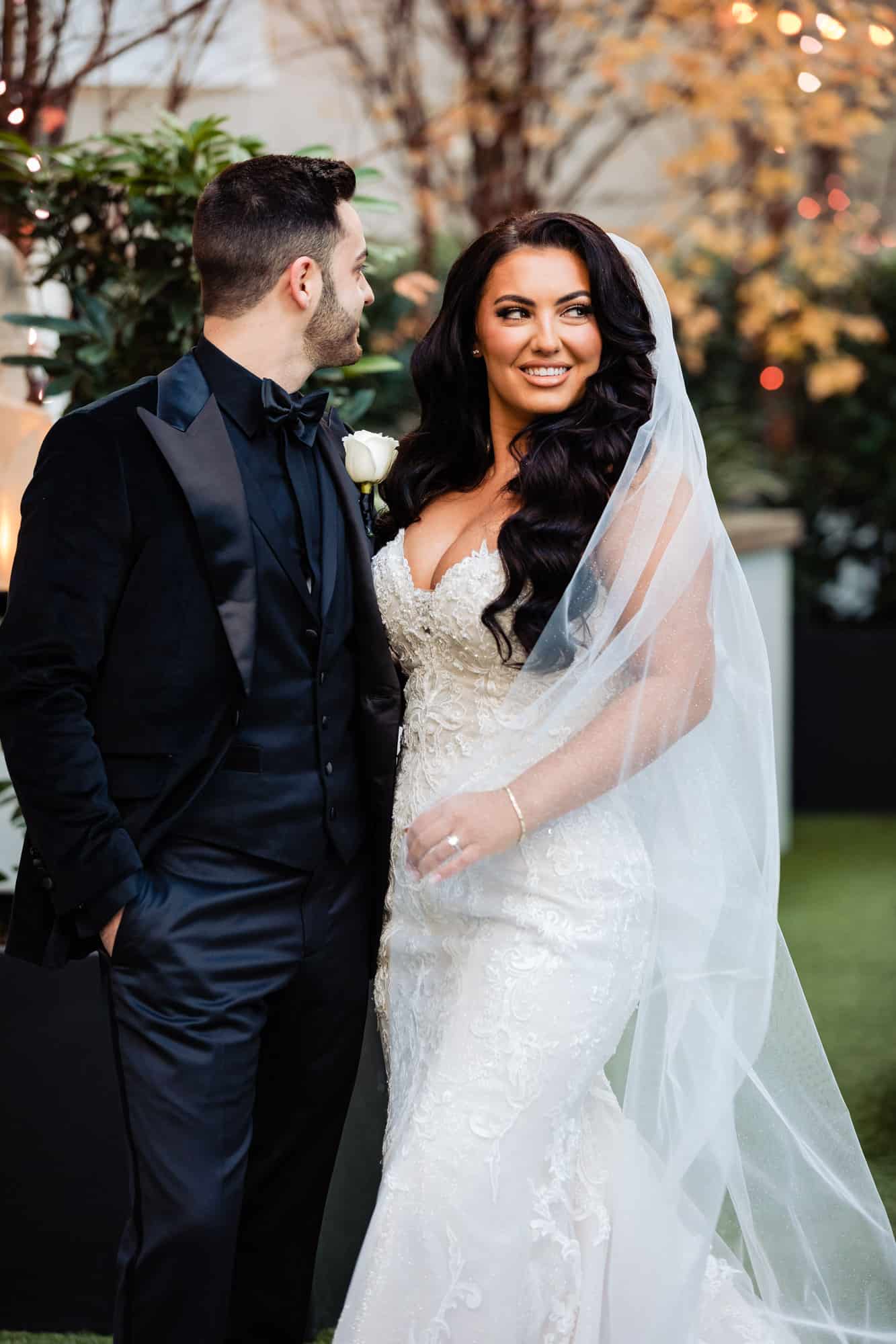 couple smiles after the first look