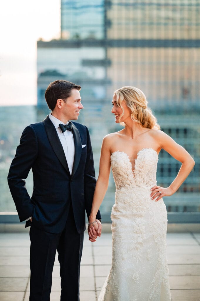 bride and groom posing for the camera