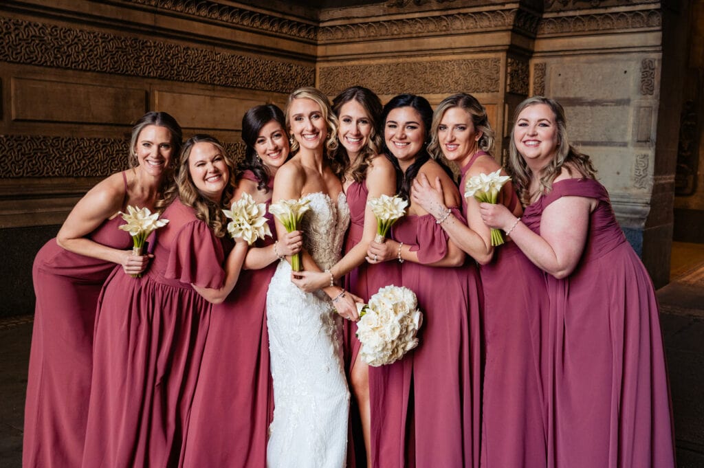 bride posing with bridesmaids